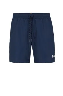 Bañador tipo shorts de secado rápido con ribeteado y logo