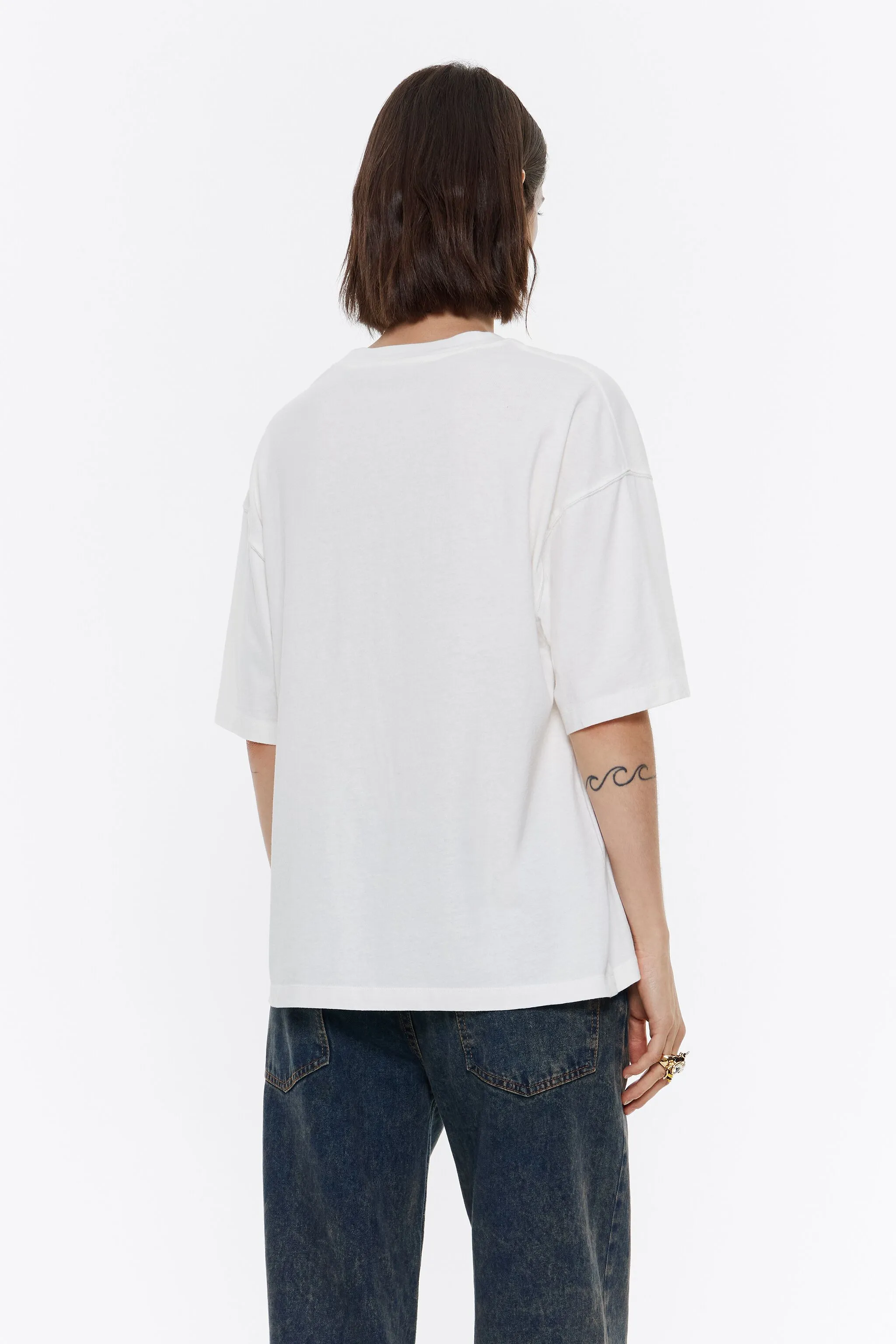 Camiseta oversize logo marfil